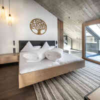 Glanzer Homes Längenfeld Zentrum Schlafzimmer sunnige Suite